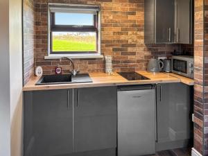 Köök või kööginurk majutusasutuses The Old Weighbridge