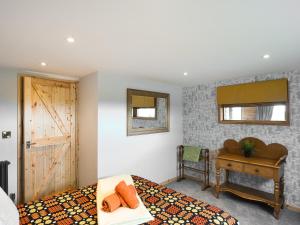 Ένα ή περισσότερα κρεβάτια σε δωμάτιο στο Cowlas +9 φωτογραφίες