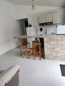 Η κουζίνα ή μικρή κουζίνα στο casa praia matinhos +9 φωτογραφίες