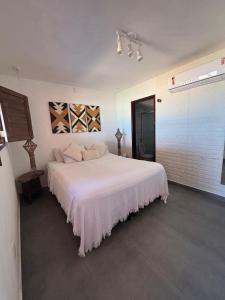 Postel nebo postele na pokoji v ubytování Pousada Sagi Manga Rosa