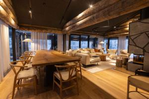 Posezení v ubytování Chalet Magical Forest Harjunpolku Lapland