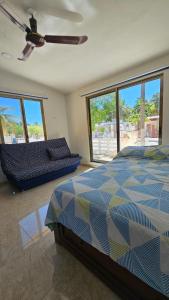 Ένα ή περισσότερα κρεβάτια σε δωμάτιο στο Apartment with pool and beach club access