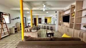 Et tv og/eller underholdning på Casa Adélia - Conforto e aconchego a Beira Mar