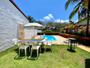 Swimmingpoolen hos eller tæt på Casa Adélia - Conforto e aconchego a Beira Mar