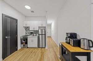 Η κουζίνα ή μικρή κουζίνα στο The Outstanding NYC