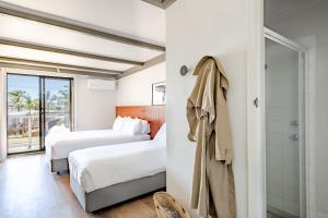 Postel nebo postele na pokoji v ubytování Tween Waters Merimbula