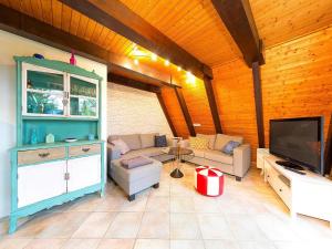 Μια τηλεόραση ή/και κέντρο ψυχαγωγίας στο Chalet by Lake Constance with Alpine Views