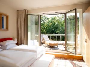 Ένα ή περισσότερα κρεβάτια σε δωμάτιο στο Aalernhus Residenzen in St Peter-Ording +35 φωτογραφίες