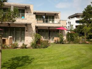 Κήπος έξω από το Aalernhus Residenzen in St Peter-Ording