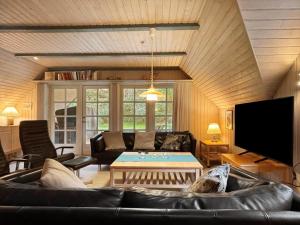 Телевизор и/или развлекательный центр в 0329-Romo-Langdalsvej-42