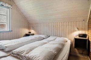 Кровать или кровати в номере 0329-Romo-Langdalsvej-42