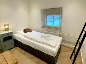 Ένα ή περισσότερα κρεβάτια σε δωμάτιο στο Pleasant apartment near Valkenburg