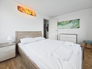 Postel nebo postele na pokoji v ubytování Central 2BR by Stavanger BnB - Pedersgata 55