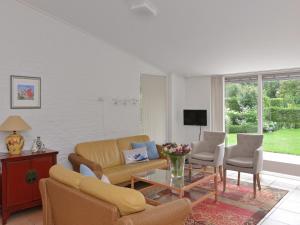 Телевизор и/или развлекательный центр в Bungalow near Lake Veere for Water Sports