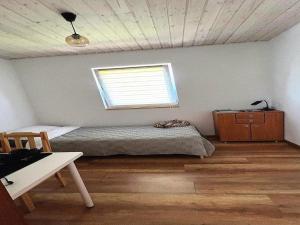 En eller flere senge i et værelse på Holiday Home near Baltic Sea & Golf Course