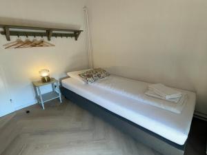 Ένα ή περισσότερα κρεβάτια σε δωμάτιο στο Cozy Voerendaal Getaway for 4