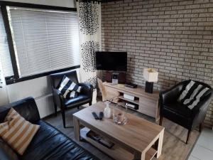 Khu vực ghế ngồi tại Holiday home with large terrace