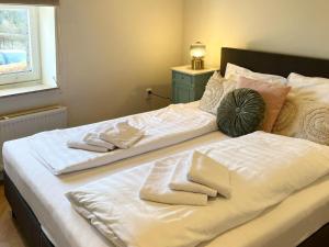 Ένα ή περισσότερα κρεβάτια σε δωμάτιο στο Holiday home in Voerendaal with garden