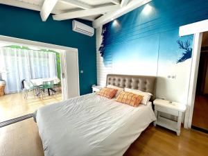 Postel nebo postele na pokoji v ubytování Caribbean Loft - SXM