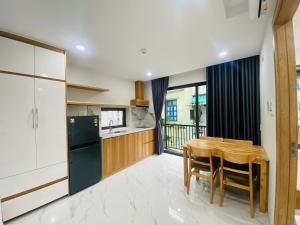 Η κουζίνα ή μικρή κουζίνα στο Sujet Center Hotel by Haviland