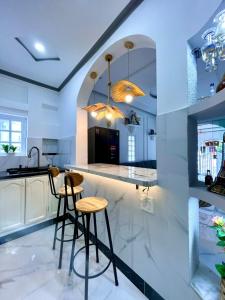 Η κουζίνα ή μικρή κουζίνα στο Hoàng Nga 1 Apartment