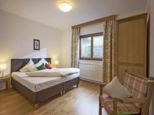 Giường trong phòng chung tại Apartment in Kaltenbach near Ski Lifts