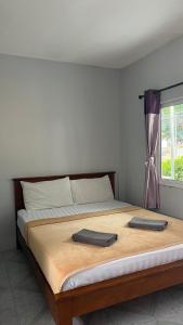 Ένα ή περισσότερα κρεβάτια σε δωμάτιο στο Gypsy Village Resort