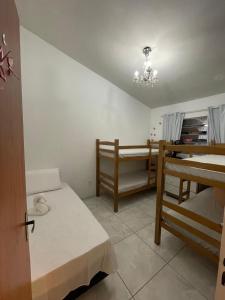 Ένα ή περισσότερα κρεβάτια σε δωμάτιο στο Garden JP