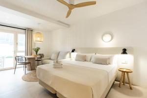 Ένα ή περισσότερα κρεβάτια σε δωμάτιο στο Vacança beach +136 φωτογραφίες