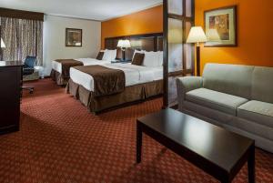 Ένα ή περισσότερα κρεβάτια σε δωμάτιο στο Baymont by Wyndham Lubbock +9 φωτογραφίες