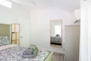 Ένα ή περισσότερα κρεβάτια σε δωμάτιο στο Spacious Two Bedroom Apartment +29 φωτογραφίες