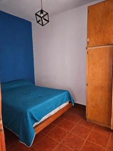 En eller flere senge i et værelse på El bosquesito