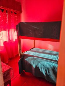 En eller flere senge i et værelse på El bosquesito