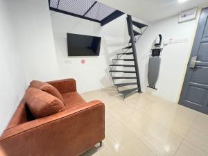 Μια τηλεόραση ή/και κέντρο ψυχαγωγίας στο Seeds Hotel Premier Chow Kit Kuala Lumpur