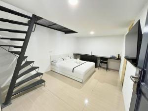 Ένα ή περισσότερα κρεβάτια σε δωμάτιο στο Seeds Hotel Premier Chow Kit Kuala Lumpur +32 φωτογραφίες