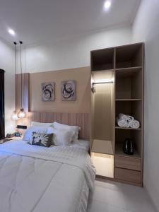 Postel nebo postele na pokoji v ubytování Summerville Homes