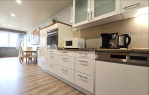 Kuchyň nebo kuchyňský kout v ubytování Seepferdchen