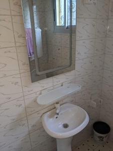 Koupelna v ubytování Endjilo luxueuse Home + 9 fotografií