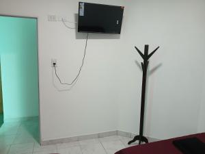 TV a/nebo společenská místnost v ubytování La Perla