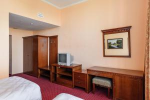 TV a/nebo společenská místnost v ubytování Горнолыжный курорт Ак Булак