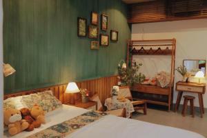 En eller flere senge i et værelse på Soda Boutique Apartment Danang