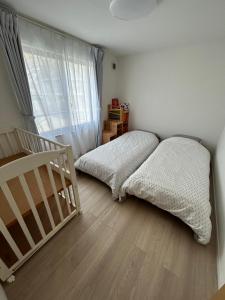 Postel nebo postele na pokoji v ubytování Hiei Mountain House + 9 fotografií