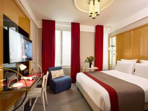 Giường trong phòng chung tại l'Echiquier Opéra Hotel Paris - MGallery Collection +160 ảnh