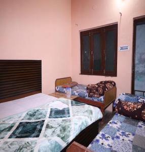 Posezení v ubytování Siddhi Vinayak Residency By StayApart + 1 fotografie