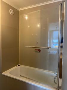 Et badeværelse på Departamentos Pehumayen + 14 billeder