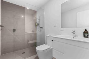 Et badeværelse på Saltaire by Experience Jervis Bay + 9 billeder