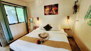 Ένα ή περισσότερα κρεβάτια σε δωμάτιο στο Feel Home