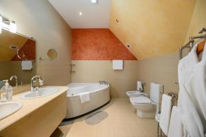 Koupelna v ubytování Горнолыжный курорт Ак Булак + 30 fotografií