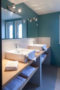 Koupelna v ubytování Hotel Les Embruns