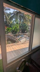 Balkón nebo terasa v ubytování Nandish Guest House